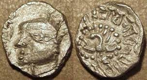Head of the king and peacock on two of the sides - Vardhana coin