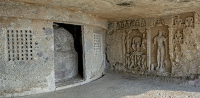 Stupa and Buddha Statue at Mahakali Caves