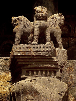 Lion sculptures in top of pillar in front of chaitya